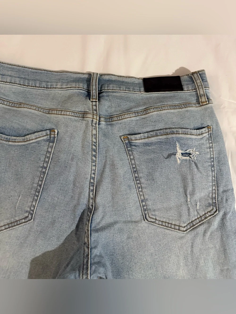 Original Use Slim Taper Distressed Light Wash Jeans